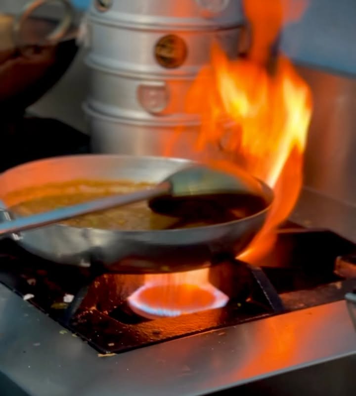 bitez.io culinary preparation with live fire and fresh craft